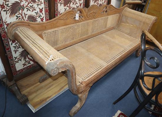 A 19th century Javanese double scroll end sofa W.211cm